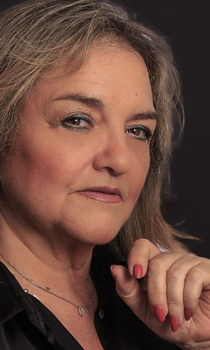 Mari Carmen Sinti obrir