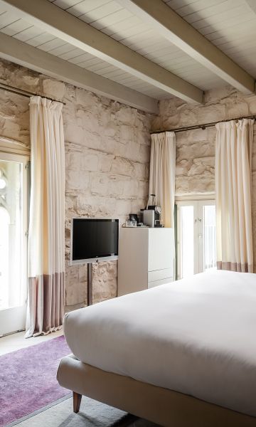 Una de les habitacions d’aquest edifici amb molta història. © Mercer Hotel Una de les habitacions d’aquest edifici amb molta història. © Mercer Hotel
